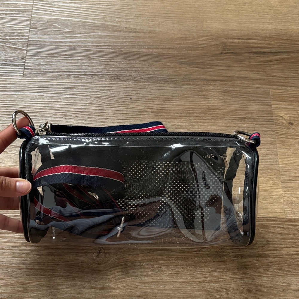 Clear Cylinder Crossbody/Wristlet Bag with Black Trim and Navy/Red Strap